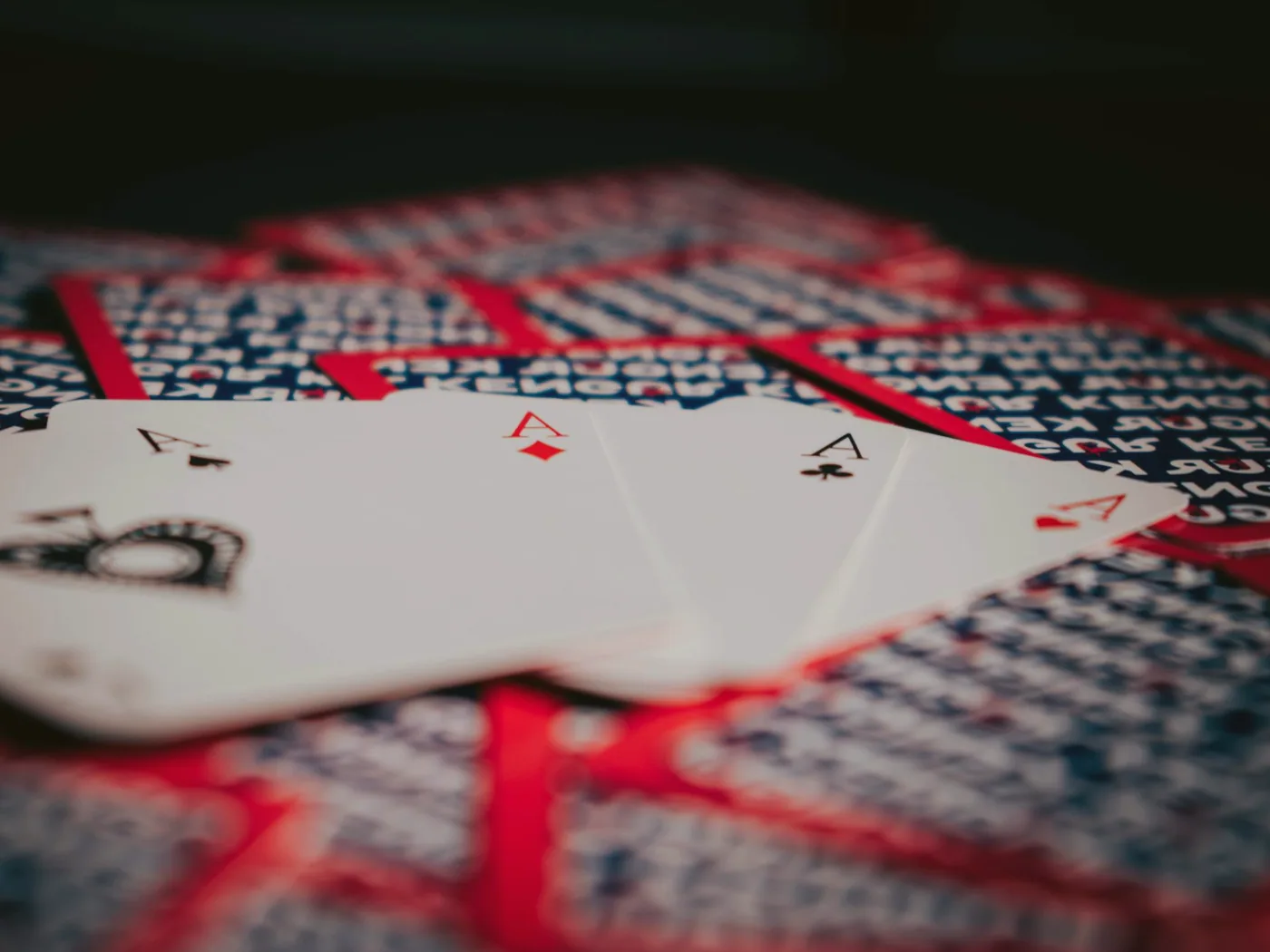 A cup set down beside a hand mid-play
